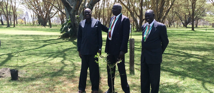 From left to right: Paramount Chief Dut Malual Arop, Agaar Dinka, Lakes; Chief Simon Lokuji Wani, Bari, Central Equatoria; and Paramount Chief Jacob Madhel Lang Juk, Tuic Dinka, Warrap, planting a tree to commemorate their meeting in July 2015, Naivasha, Kenya.